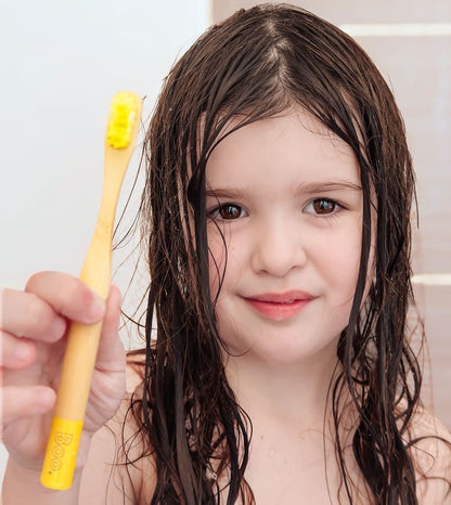Yellow  bamboo toothbrush for older kids