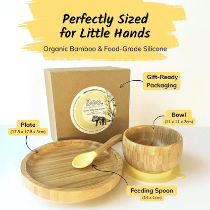 Bamboo children's tableware set with packaging labeled 'Boo' on a light background.