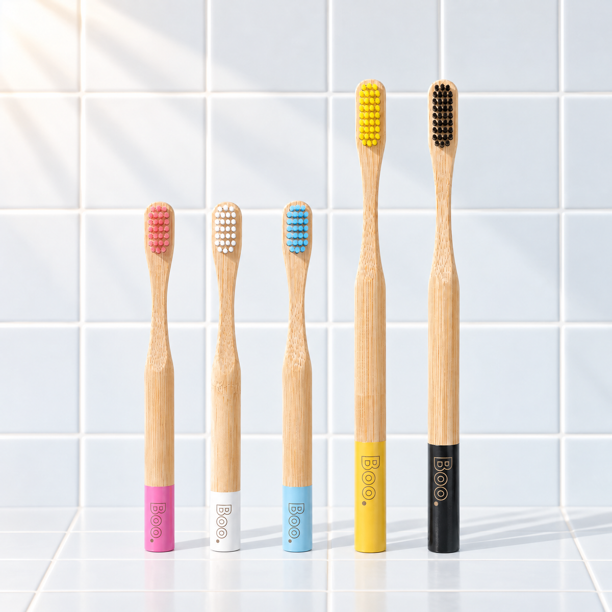 Boo family five pack: three kids bamboo toothbrushes and two adult bamboo toothbrushes in assorted colours