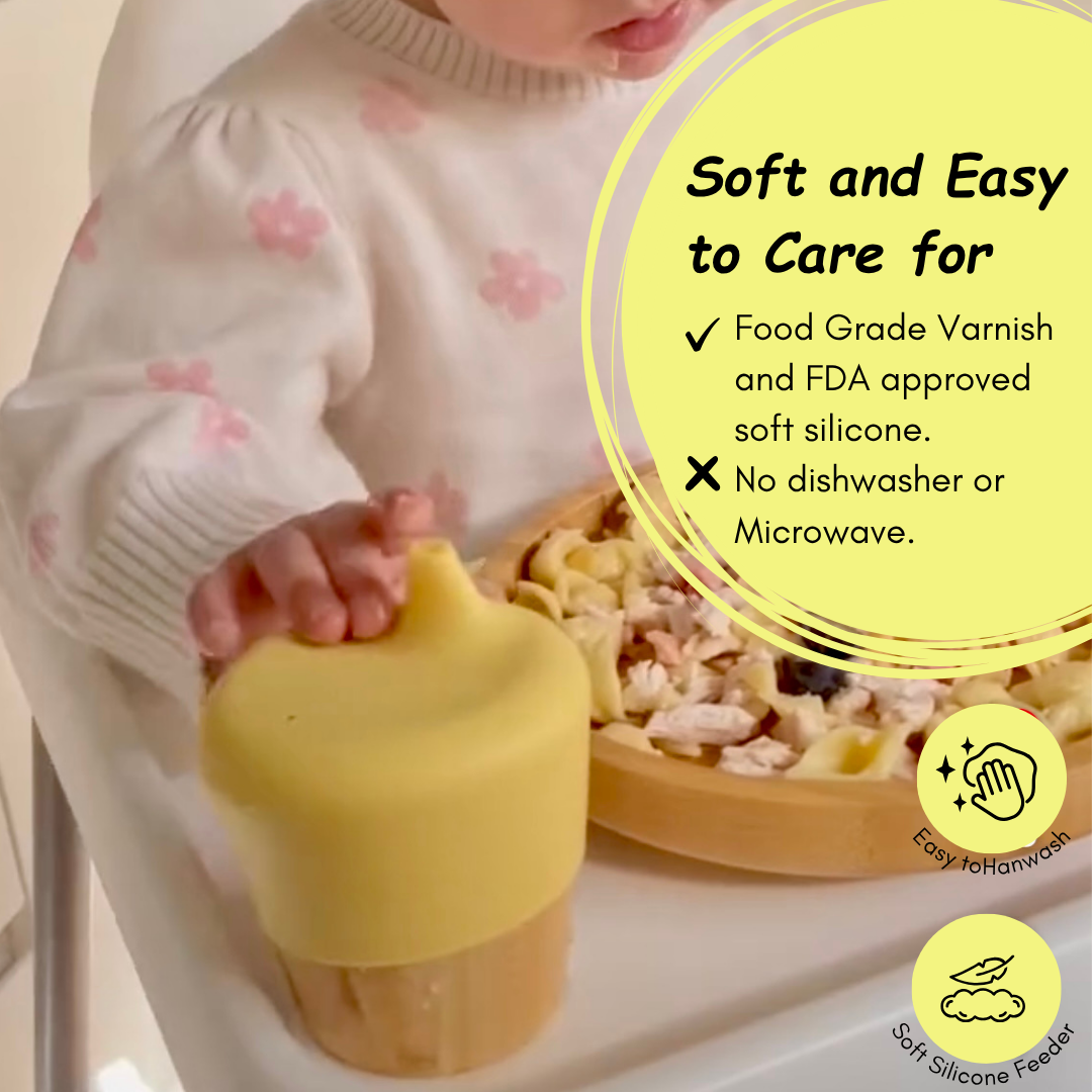 Child holding a yellow and beige silicone feeder with text about its care instructions.